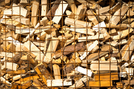 pieces of wood for the fireplace stackedの写真素材