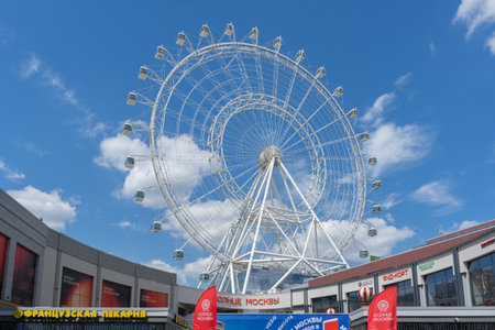 Moscow, Russia June 15 2024: Sun of Moscow red logo on above entrance. Sun of Moscow is a panoramic ferris wheel in VDNHのeditorial素材