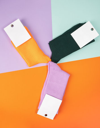 Different color socks with blanc label. advertising, logo, branding. Socks with white label for your...