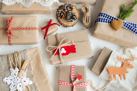 Christmas zero waste on white background. Hand crafted gifts with natural xmas decorationsw rapping craft paper without plastic. Ecological concept, eco-friendly, eco decor new year.の写真素材