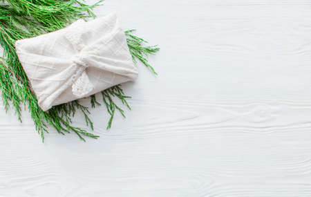 Zero waste Christmas gift boxes wrapping in traditional Japanese Furoshiki style. Hand crafted gifts...