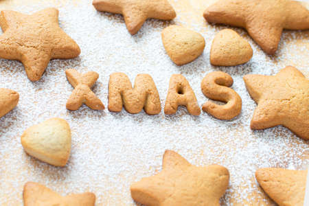 Christmas food. Cookies in the form of XMAS lettering in the form of gingerbread cookies stars on...