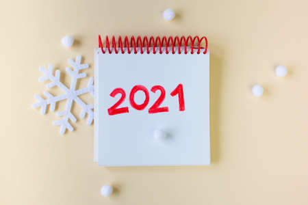 Merry Christmas, Happy Holidays and New Year. Xmas 2021. Notepad text 2021