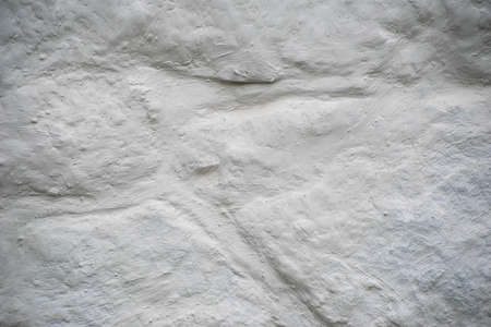 Close up detail of freshly whitewashed colonial stone wall.の写真素材