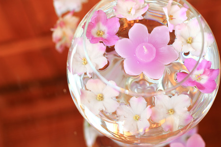 Aroma Bowl with lilac Candles and Flowersの写真素材