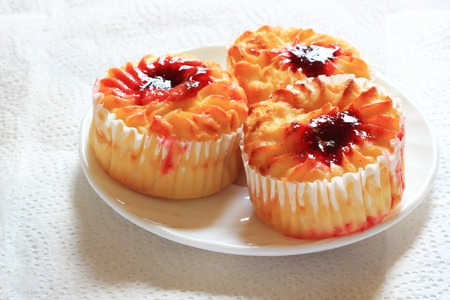 Cheese muffins with cherry jam. A light snack.