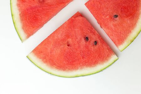 Close-up of fresh slices of red watermelon, top view, summer or food concept