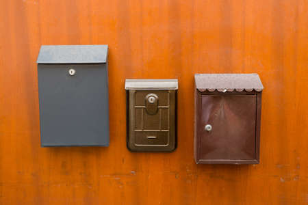 Old letterboxes on the brown door, Vintage post box or letterbox