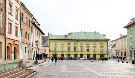 Cracow, Poland - February 29, 2020 Stylish historic buildings on Maly Rynek. Small Market in Krakow.