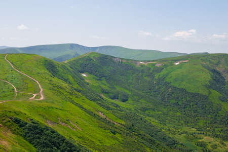 Panoramic views of the beautiful landscape in the Carpathian mountains. Tourism or Freedom concept. Wild nature, summer landscape. Discover the beauty of earth.の写真素材