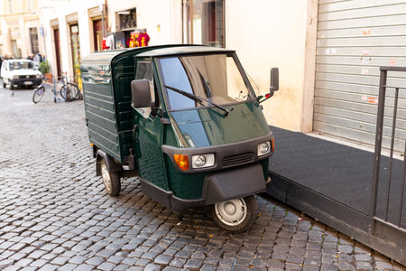 Auto rickshaw or tuk-tuk in a street, transportation concept