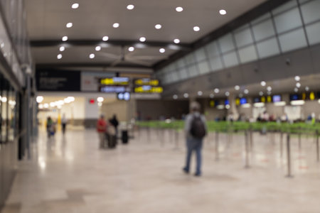 Abstract blur and defocused airport terminal. People in airport. Traveling concept.の写真素材