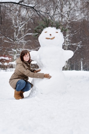 Happy middle age woman having fun in winter の写真素材