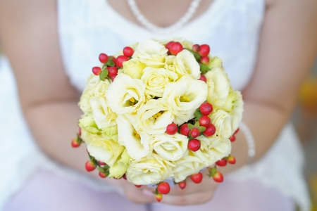 Bride holding beautiful wedding flowers bouquet の写真素材