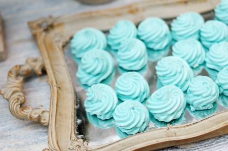 Delicious fancy mint pastila on wooden trayの写真素材