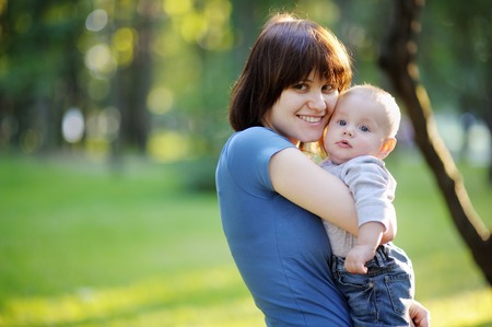 Young woman with her little baby boyの写真素材