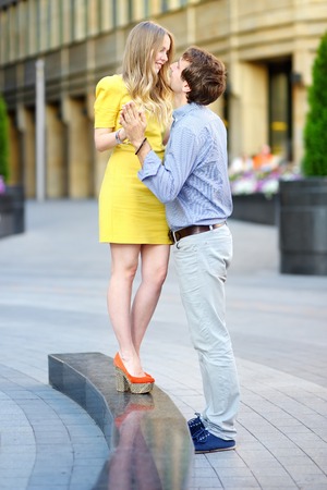 Young beautiful romantic couple portrait at cityの写真素材