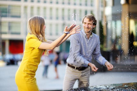 Young dating couple having fun in a city