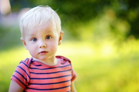 Outdoor portrait of toddler boyの写真素材