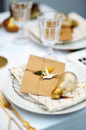 Stylish gold table set for wedding receptionの写真素材