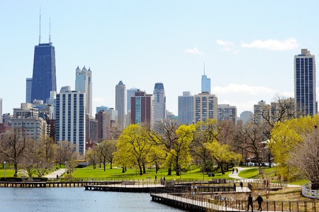Chicago skyline with skyscrapers viewed from Lincoln Park over lakeの写真素材