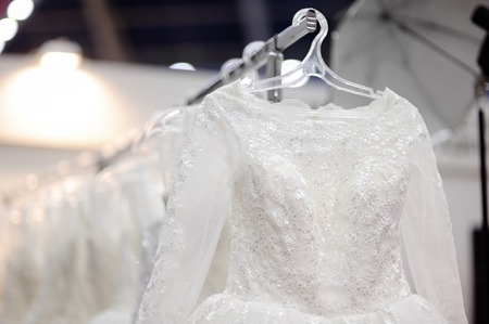 Beautiful bridal dresses or bridesmaid dresses on a mannequin. Wedding shoppingの写真素材