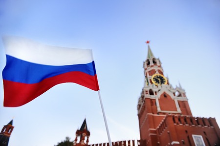 Russian flag with Spasskaya tower Russia, Moscow on background. Patriotic feeling/patriotism conceptの写真素材