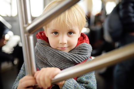 Little boy in new York subway car. Family travel with children.の写真素材