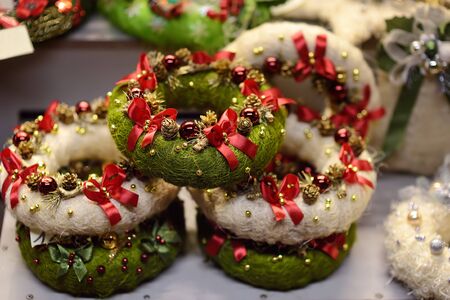 Christmas wreaths in traditional market on winter day in Tallinn, Estonia. Advent decorations.の写真素材
