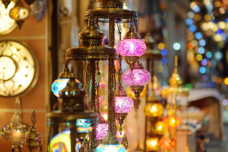 Sale of exotic Mosaic Ottoman lamps in Grand Bazaar in Istanbul, Turkey. Shopping. Authentic gifts,,...