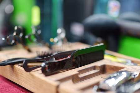 Tools set for cutting and making hairstyle barbershop. Services of a professional stylist. fashion haircut for menの写真素材