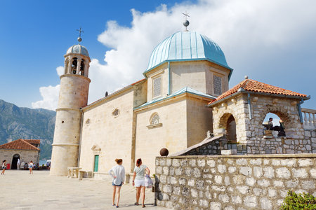 Perast, Montenegro - August 27, 2022: Tourist visited Island Our Lady of the Rock and Roman Catholic Church in Perast on Boka Kotor bay (Boka Kotorska) of Adriatic Sea in Balkan, Montenegro, Europe.のeditorial素材