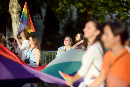 Podgorica, Montenegro - October 8, 2022: View group of people holding large rainbow flag during the Ten Lgbt Pride Parade held in Podgorica, Montenegro. Fighting for equality of sexual minoritiesのeditorial素材