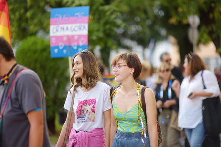 Podgorica, Montenegro - October 8, 2022: View of people column during the Ten Lgbt Pride Parade in Podgorica, Montenegro. Crowd is on city street with rainbow flag and banners. Fighting for equalityのeditorial素材