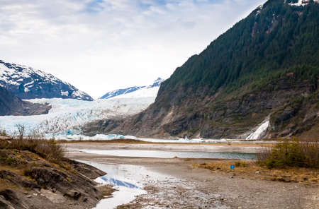 Nugget Falls at the base of Bullard Mountain, next to the Mendenhall Glacier near Juneau, Alaskaの写真素材