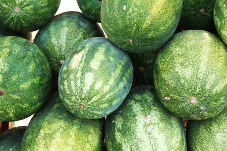 Big fresh watermelons at summer marketの写真素材