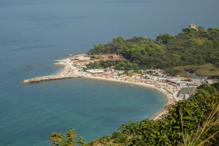 View from the top of Sirolo Italia beach, on a beautiful sunny day and blue skyの写真素材