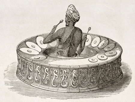 Burmese drum-armonica (Pattshaing) old illustration. By unidentified author, published on Le Tour du Monde, Paris, 1860のeditorial素材