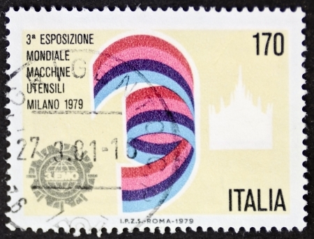 ITALY  CIRCA 1979: a stamp printed in Italy celebrates 3° Tool Machine World Expo showing a clolored symbol. Italy circa 1979のeditorial素材