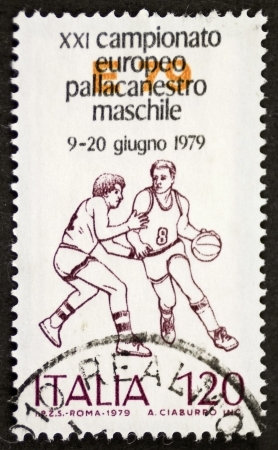 ITALY  CIRCA 1979: a stamp printed in Italy celebrates Italian basketball championship showing image of two players. Italy, circa 1979のeditorial素材