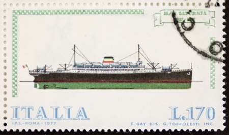 ITALY CIRCA 1977: a stamp printed in Italy shows image of  Motor ship Saturnia (Italian Navy). Italy, circa 1977のeditorial素材