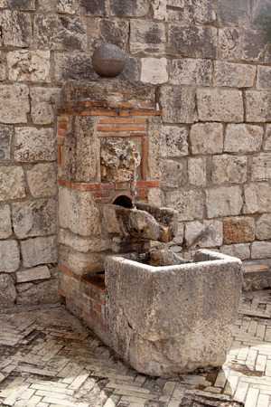 Old medieval stone fountain in Civitella sul Tronto, medieval small town in Abruzzo region, Italy
の写真素材