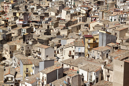 View of houses in Prizzi, small town on a hillside, Sicily