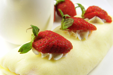 Fresh strawberry crepe cake rollの写真素材