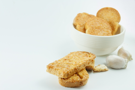 Garlic bread slice baked on white backgroundの写真素材