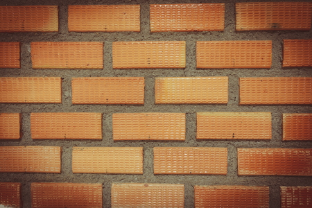 A pile of red brick closeup with color filter effectの写真素材