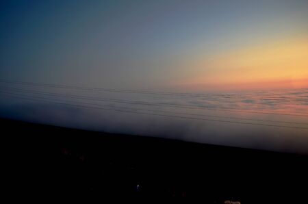 sunset in the sky with cloudsの写真素材