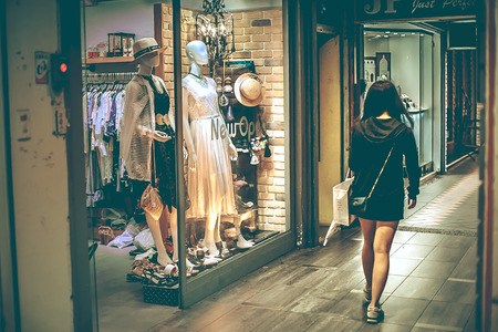 A girl walks through the windowのeditorial素材