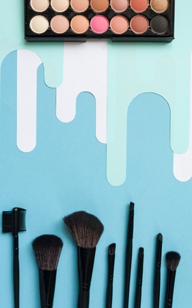 women's cosmetic accessories on pale blue and trendy background. Close up. selective focusの写真素材