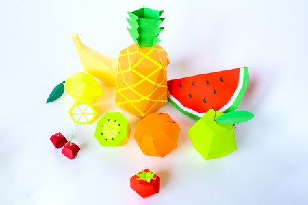 Penapple, banana, orange, apple, kiwi and watermelon cut from paper on white backgroundの写真素材